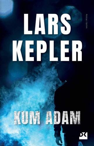 Kum Adam kitap kapağı