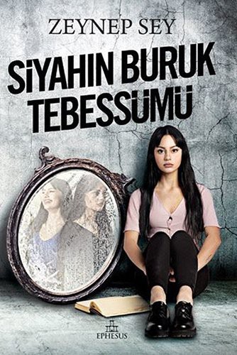 Siyahın Buruk Tebessümü kitap kapağı