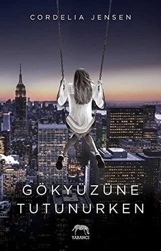 Gökyüzüne Tutunurken kitap kapağı