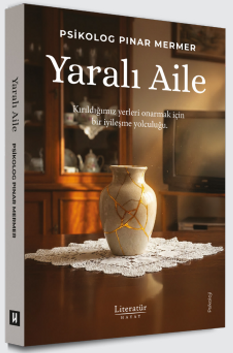 Yaralı Aile kitap kapağı